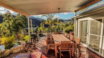 Enjoy dining and socializing on the patio, which offers a barbecue grill and comfortable seating.