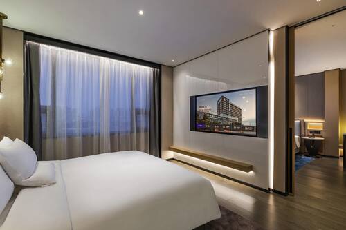 Deluxe Suite, Multiple Beds | Down comforters, memory foam beds, desk, free WiFi