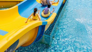A water park with multiple slides and pools. - Melia Chongqing (Chongqing)