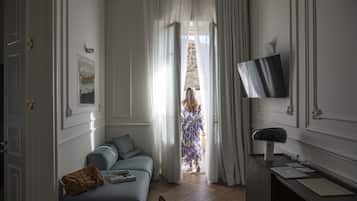 Premium bedding, down comforters, pillowtop beds, minibar