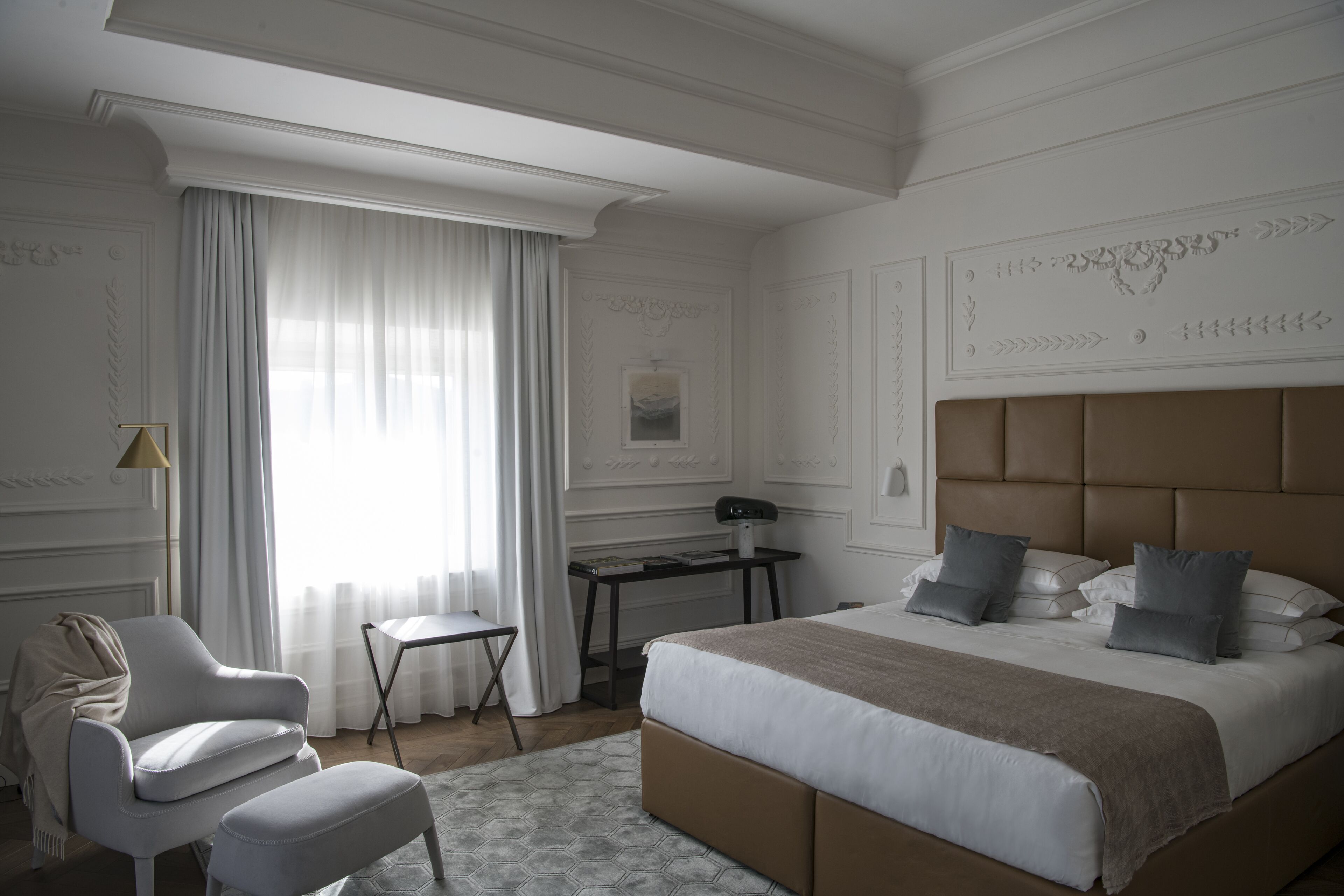 Premium bedding, down comforters, pillowtop beds, minibar