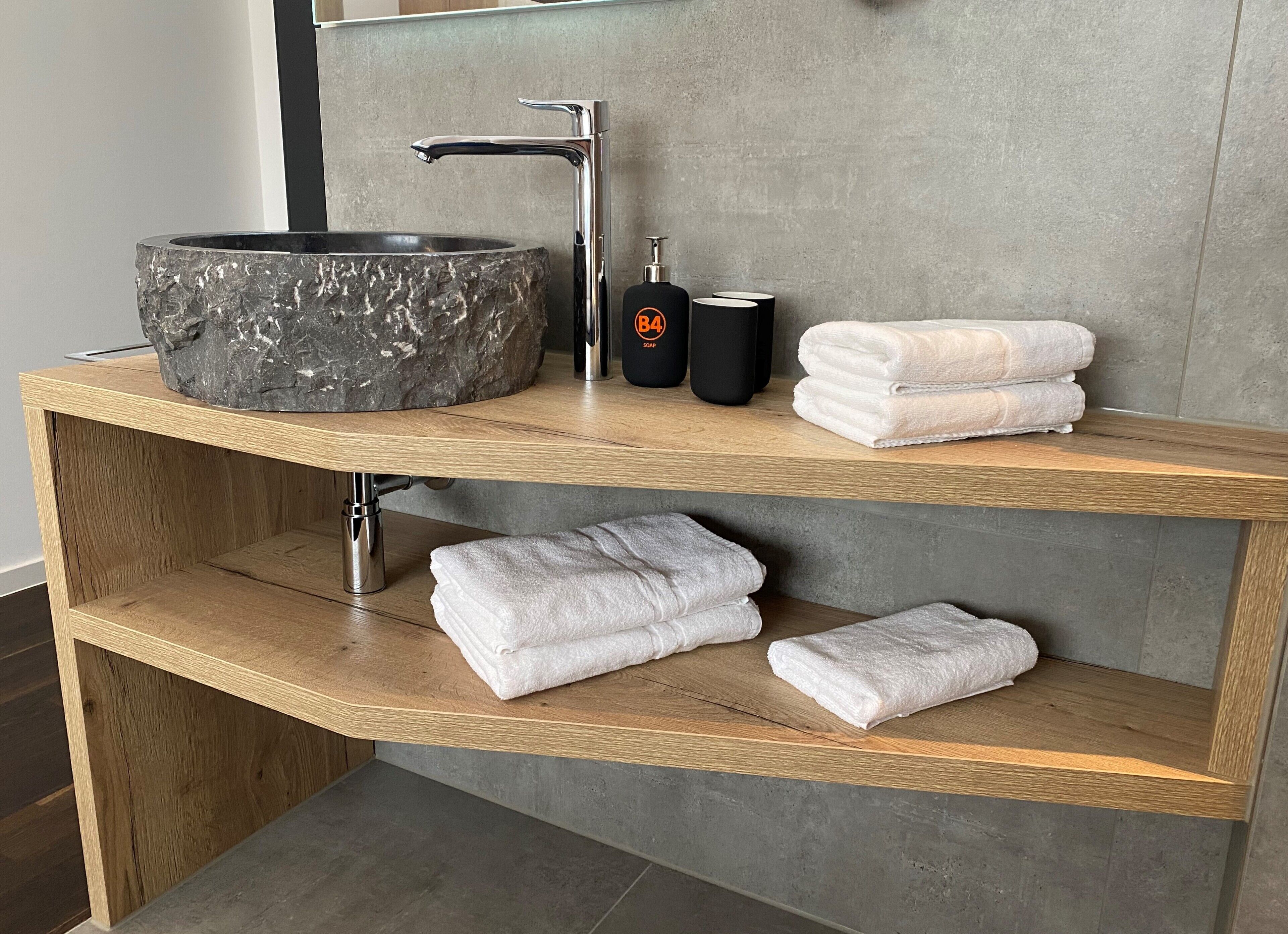 shower, rainfall showerhead, hair dryer, towels