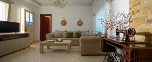 Family Villa | Living area | 32-inch LED TV with cable channels, TV - Suite Home Santorini (Santorini)
