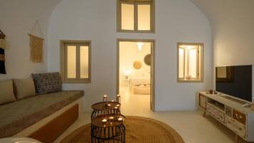 Villa Premium | Coin séjour | Télévision LED de 32 pouces avec chaßnes par cùble, télévision