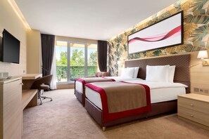 Biancheria da letto di alta qualità, minibar, cassaforte in camera