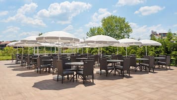 Indoor pool, open 11:00 AM to 10:00 PM, pool umbrellas, pool loungers