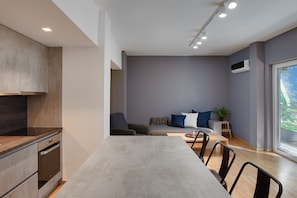 City Apartment, 1 Bedroom, Balcony | Living area | 40-inch Smart TV with digital channels, TV, Netflix