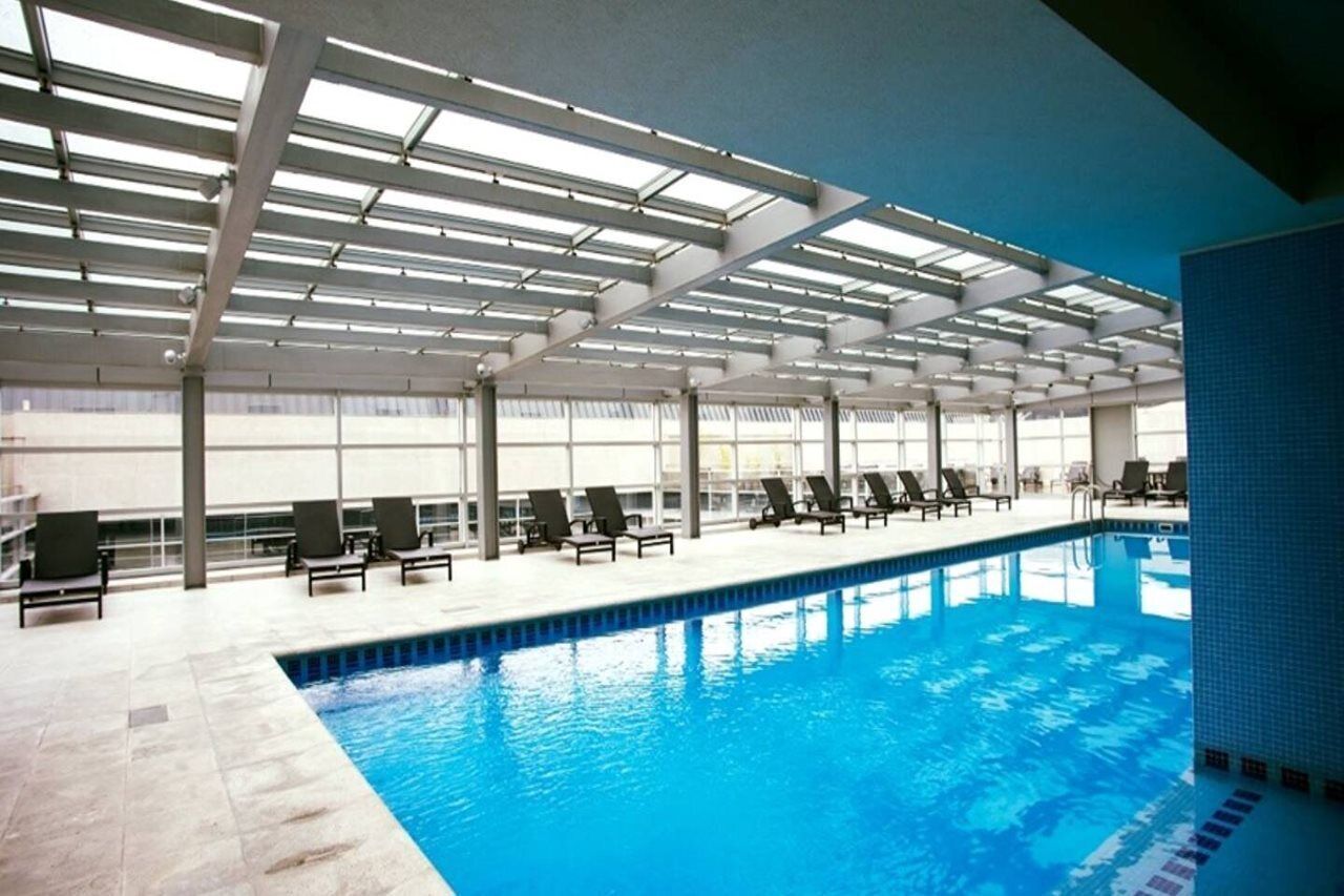 Indoor pool, outdoor pool, open 10:00 AM to 7:00 PM, pool loungers