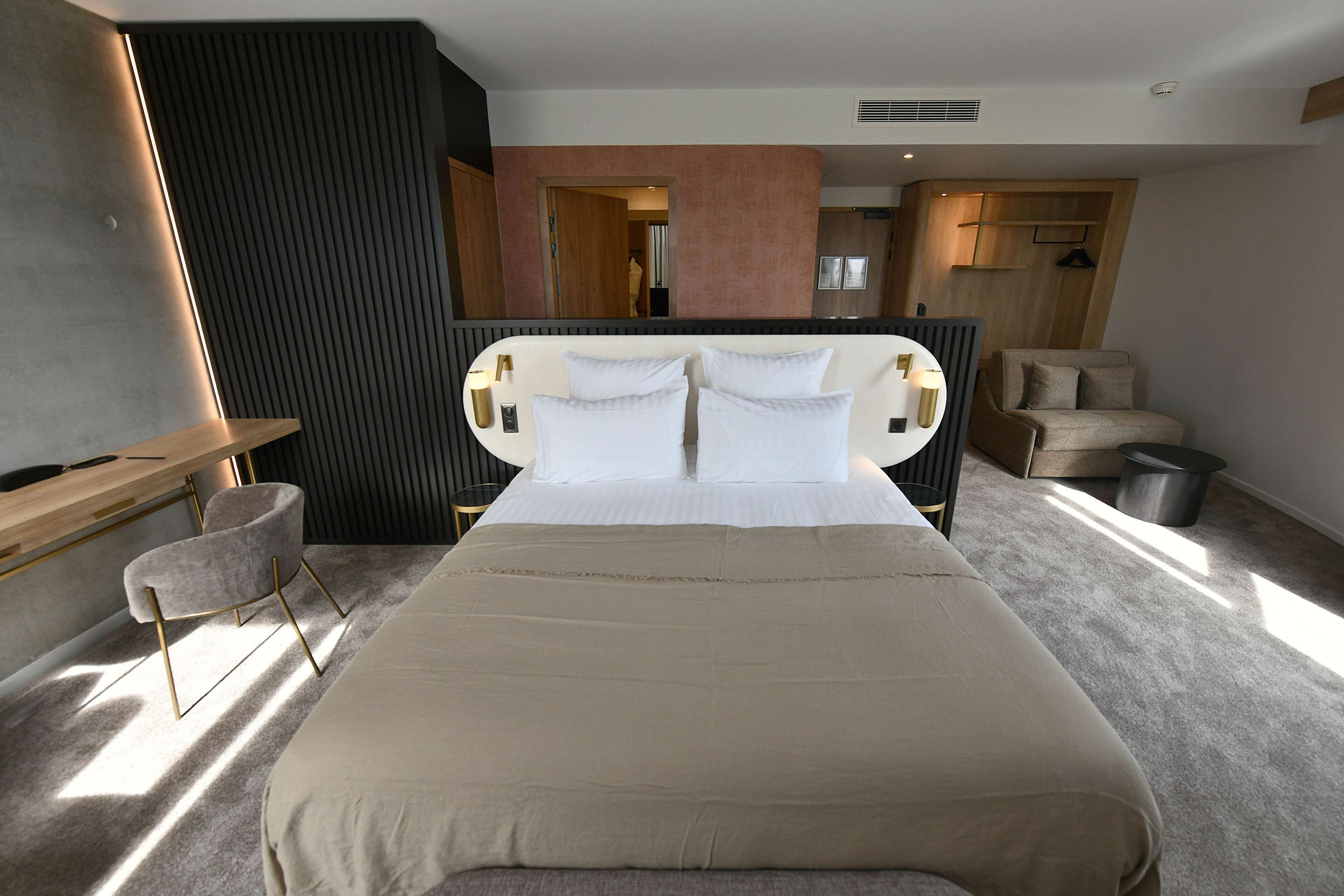 deluxe suite, multiple beds | minibar, in-room safe, desk, laptop workspace