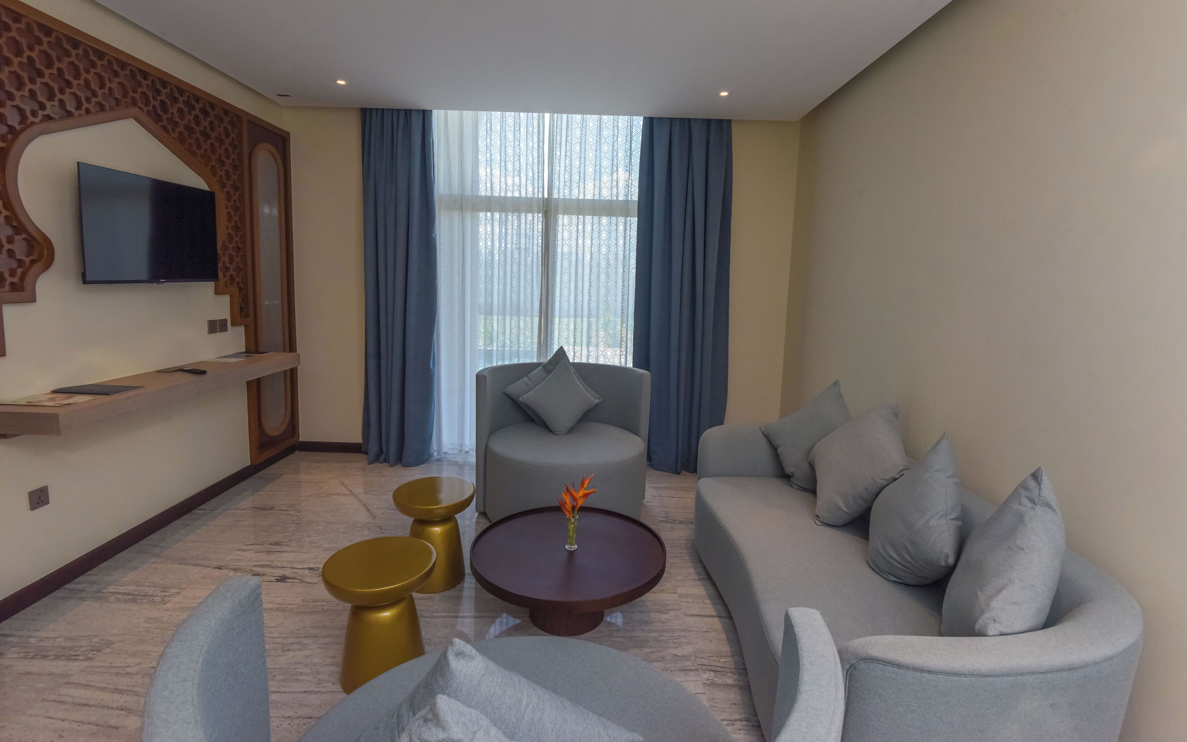 presidential suite, multiple beds | living area | 42-inch smart tv with cable channels, tv