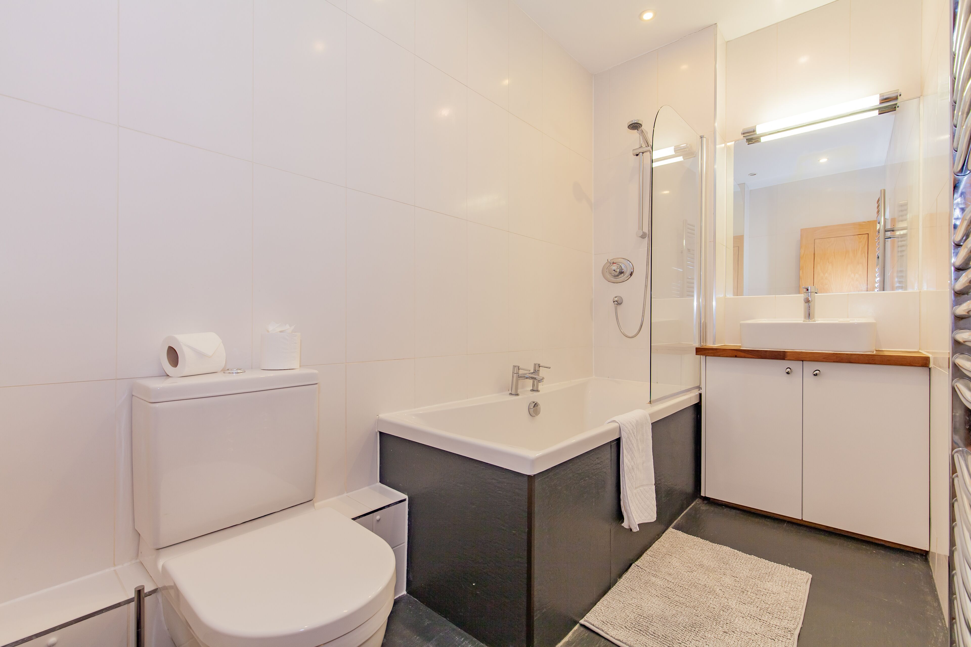 Combined shower/tub, hair dryer, towels, soap