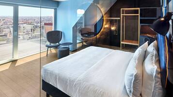 Loft (Off Beat) | Premium bedding, down comforters, blackout drapes, soundproofing