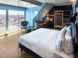 Loft (Off Beat) | Premium bedding, down comforters, blackout drapes, soundproofing