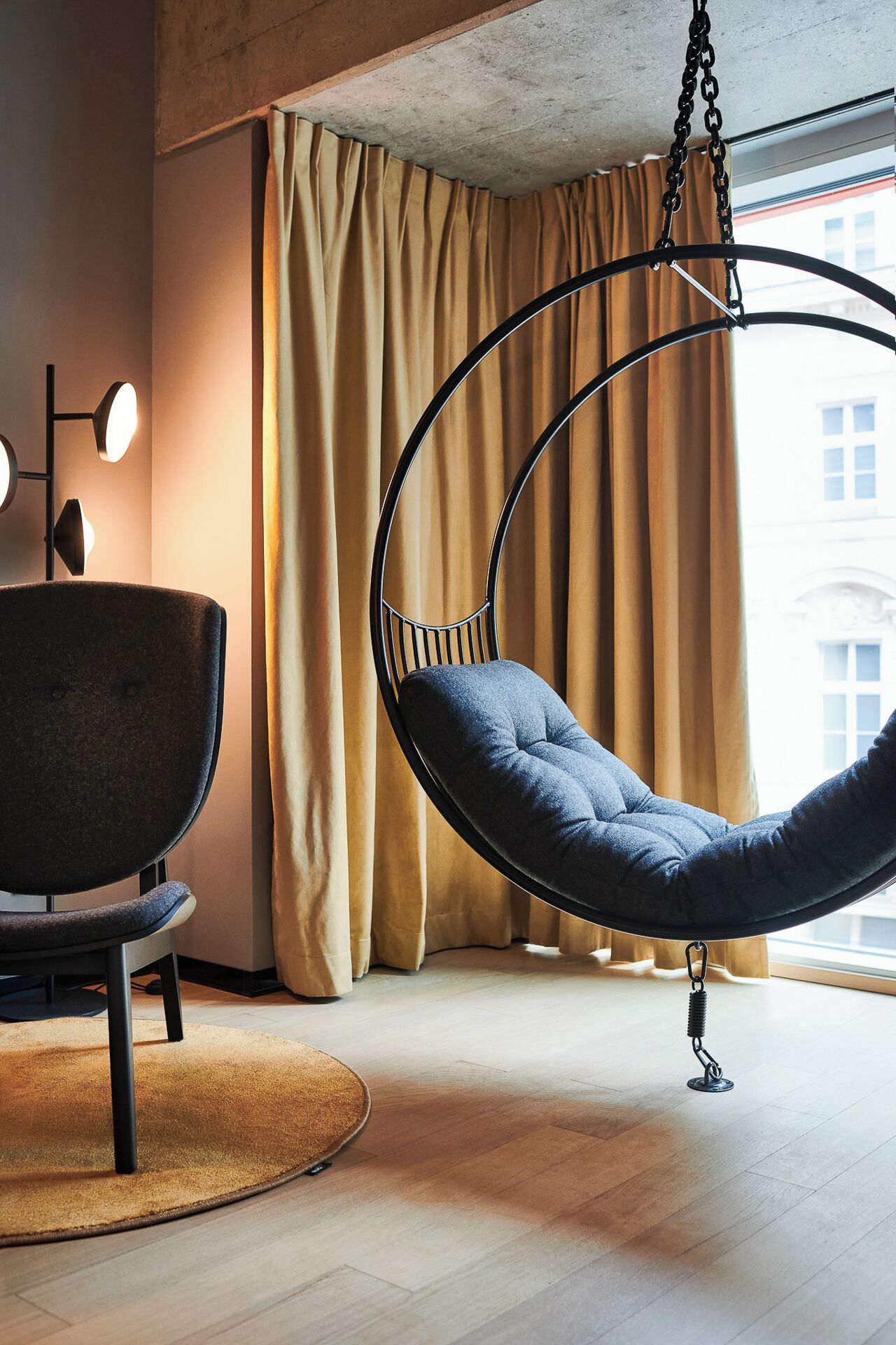 In-Tune Hanging Chair Room | Premium bedding, down comforters, blackout drapes, soundproofing