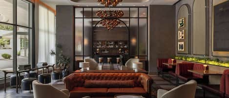 3 bars/lounges, rooftop bar, lobby lounge