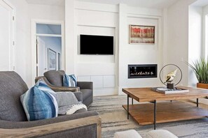 Smart TV, fireplace, foosball