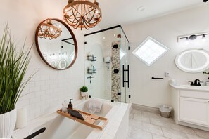Combined shower/tub, hair dryer, towels, soap