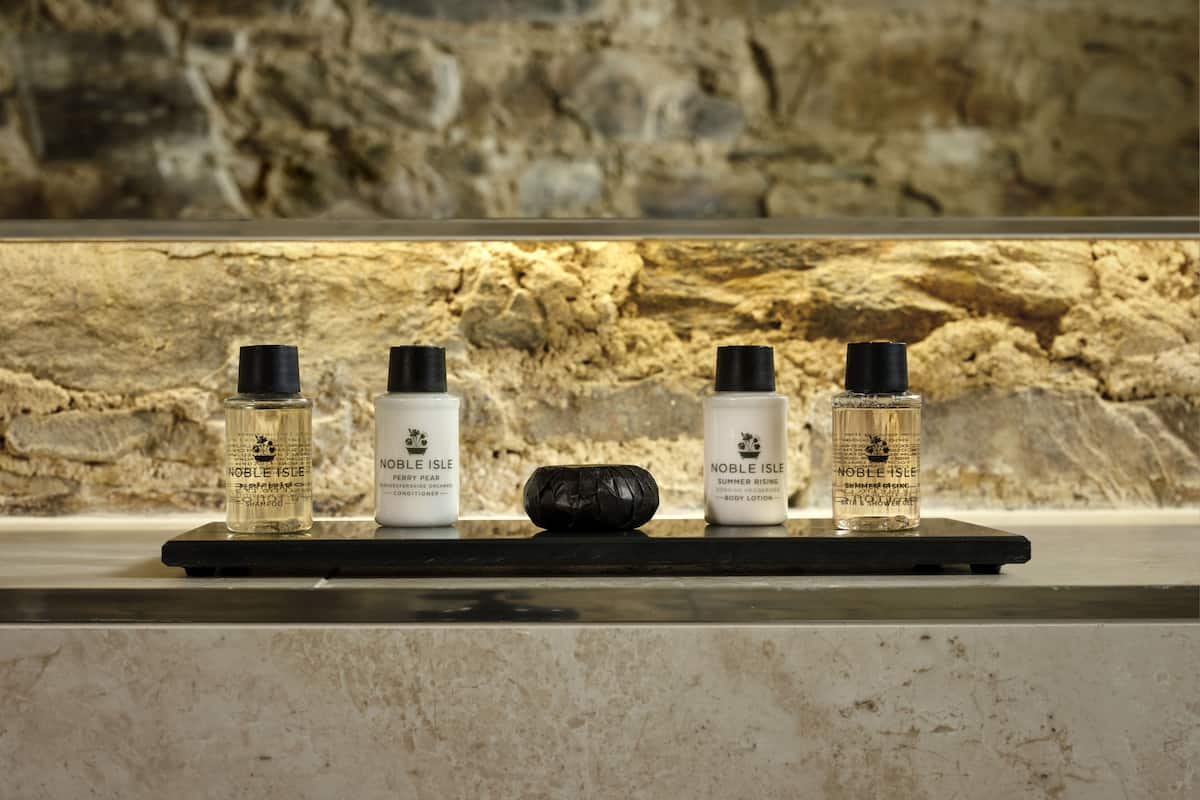 separate bathtub and shower, deep-soaking bathtub, rainfall showerhead