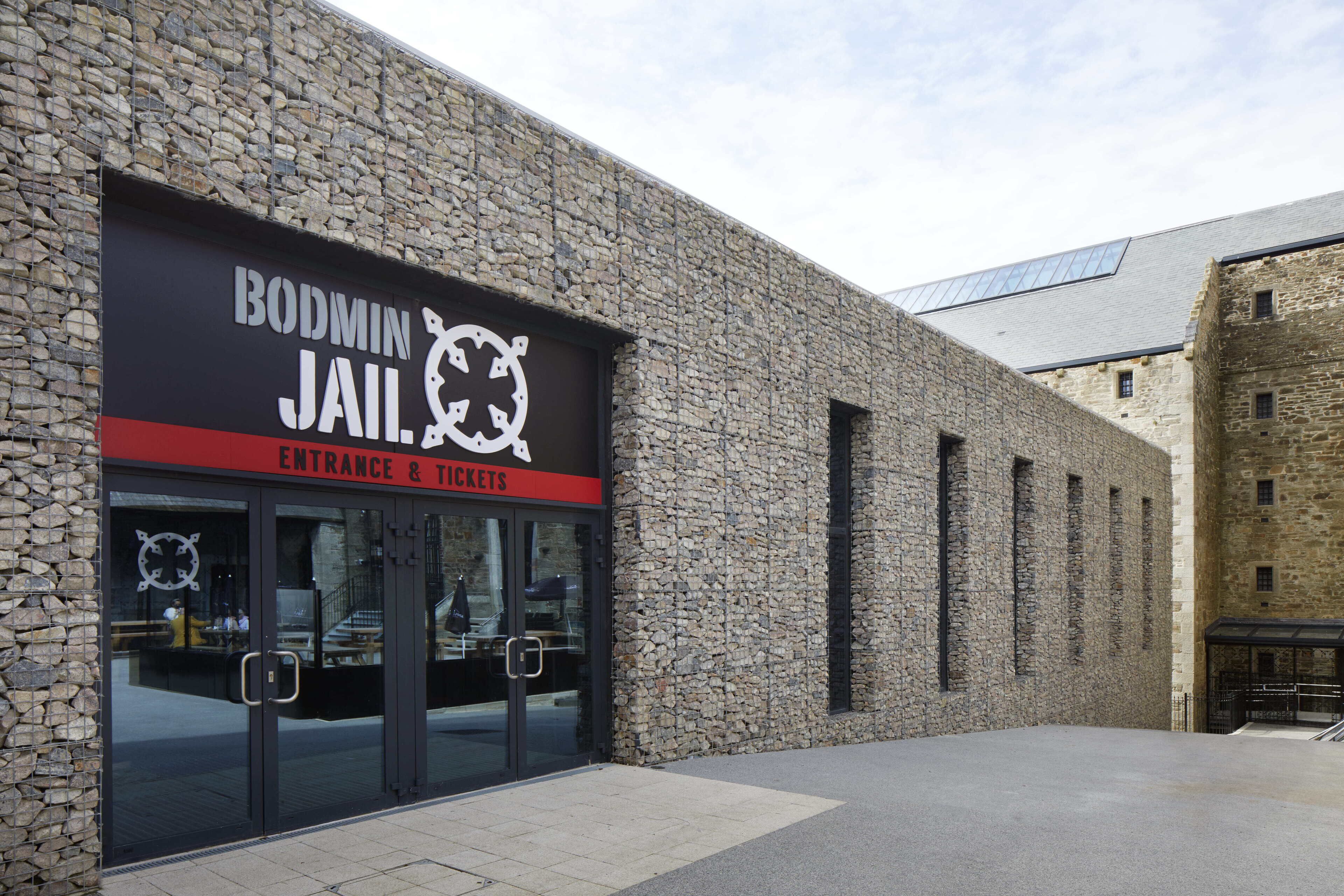 A building facade with a sign reading "Bodmin Jail. Entrance & Tickets."