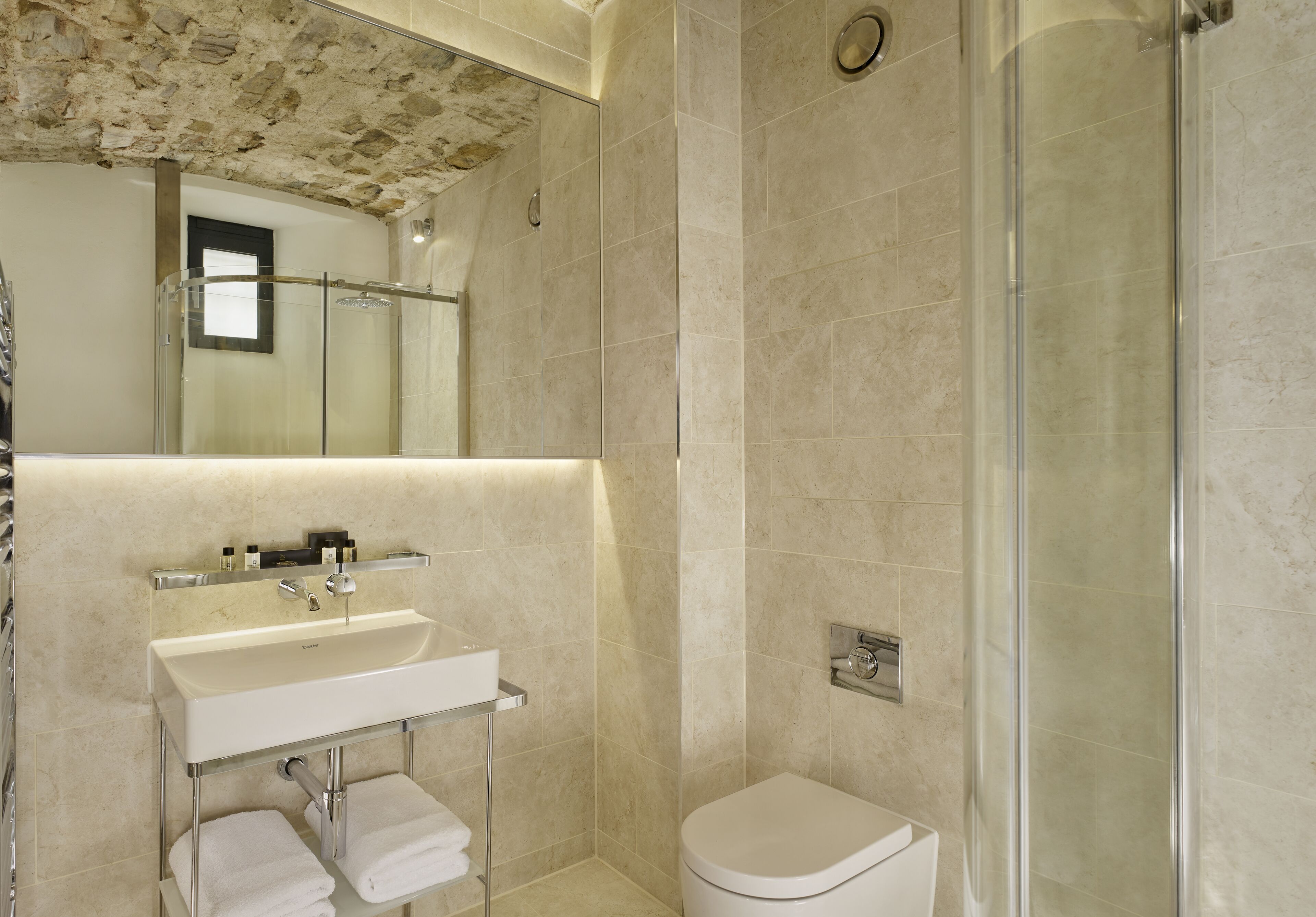 separate bathtub and shower, deep-soaking bathtub, rainfall showerhead