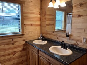 Shower, hair dryer, towels, soap - Arrowhead Cabin at Wolf Creek Guest Ranch (Fredericksburg)