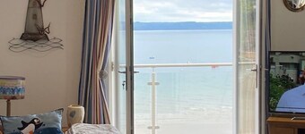 Floating Beach Hut. Seagull eye view over the famous iconic Tenby harbour.