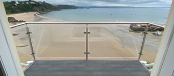 Floating Beach Hut. Seagull eye view over the famous iconic Tenby harbour.