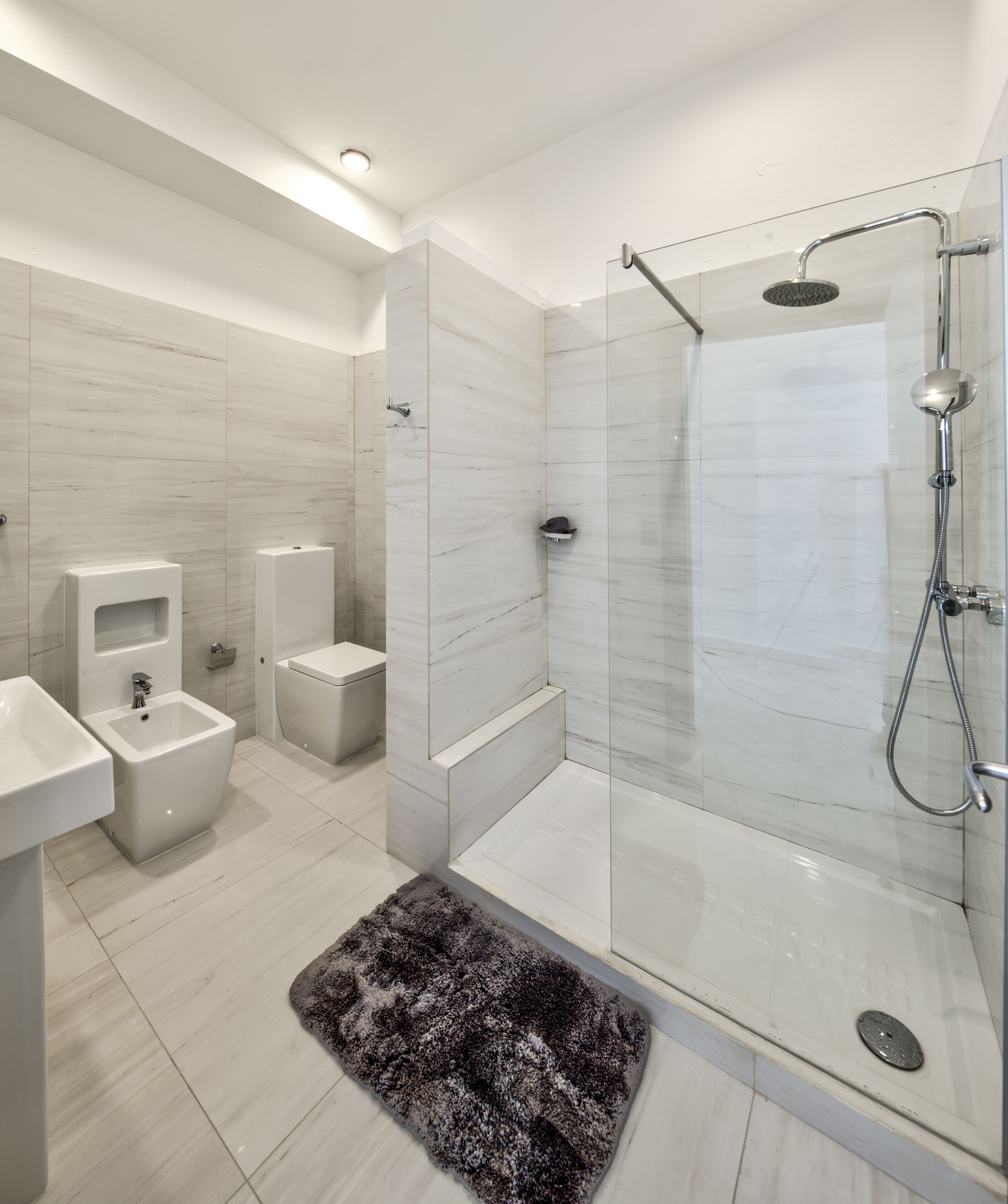 signature penthouse | bathroom | shower, rainfall showerhead, hair dryer, towels
