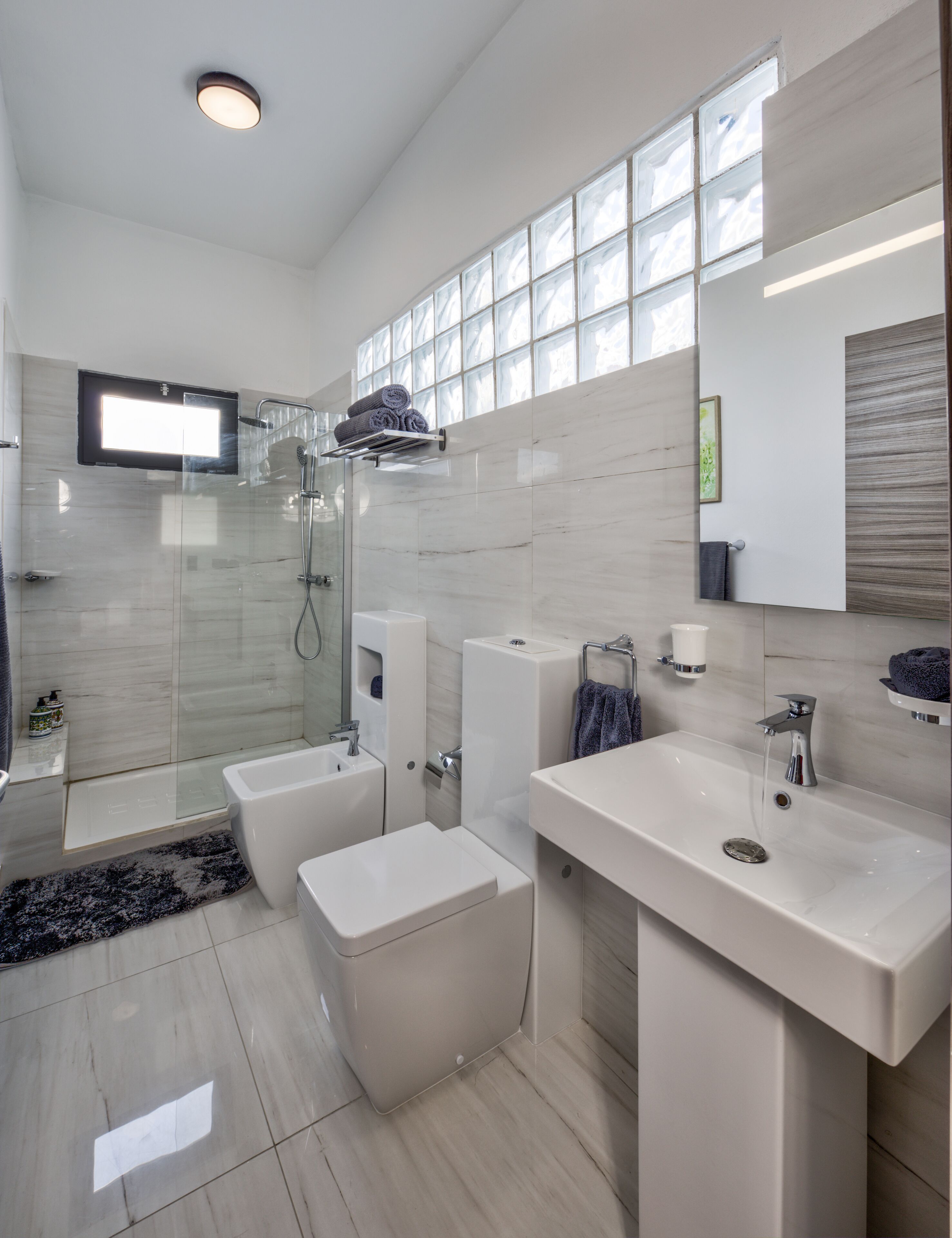 presidential penthouse | bathroom | shower, rainfall showerhead, hair dryer, towels