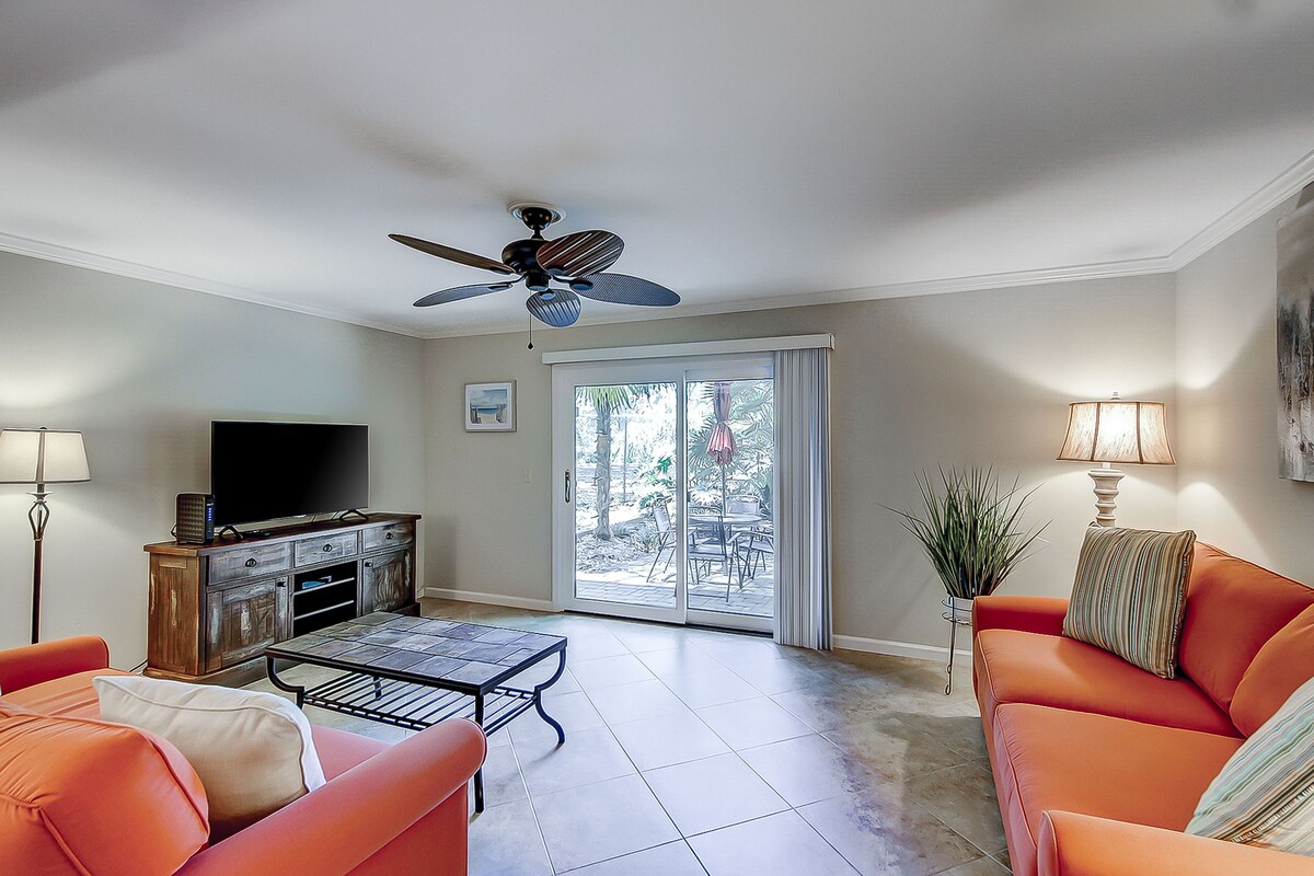 Dog-Friendly Condo w/ Fast WiFi, a Patio, & Shared Pool - Walk to the Beach