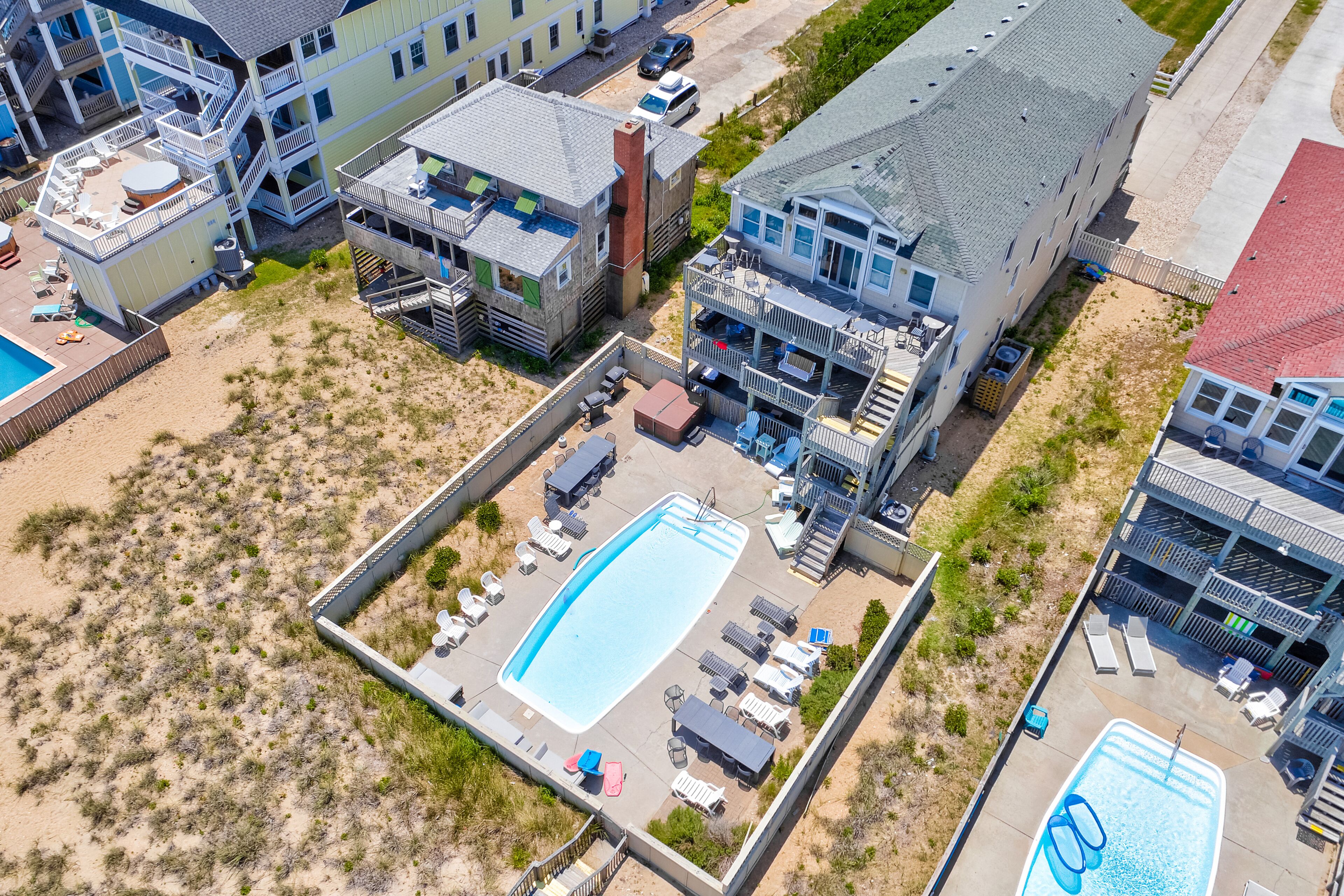 Three-story home with balconies, hot tub, heated pool, theatre, & game room