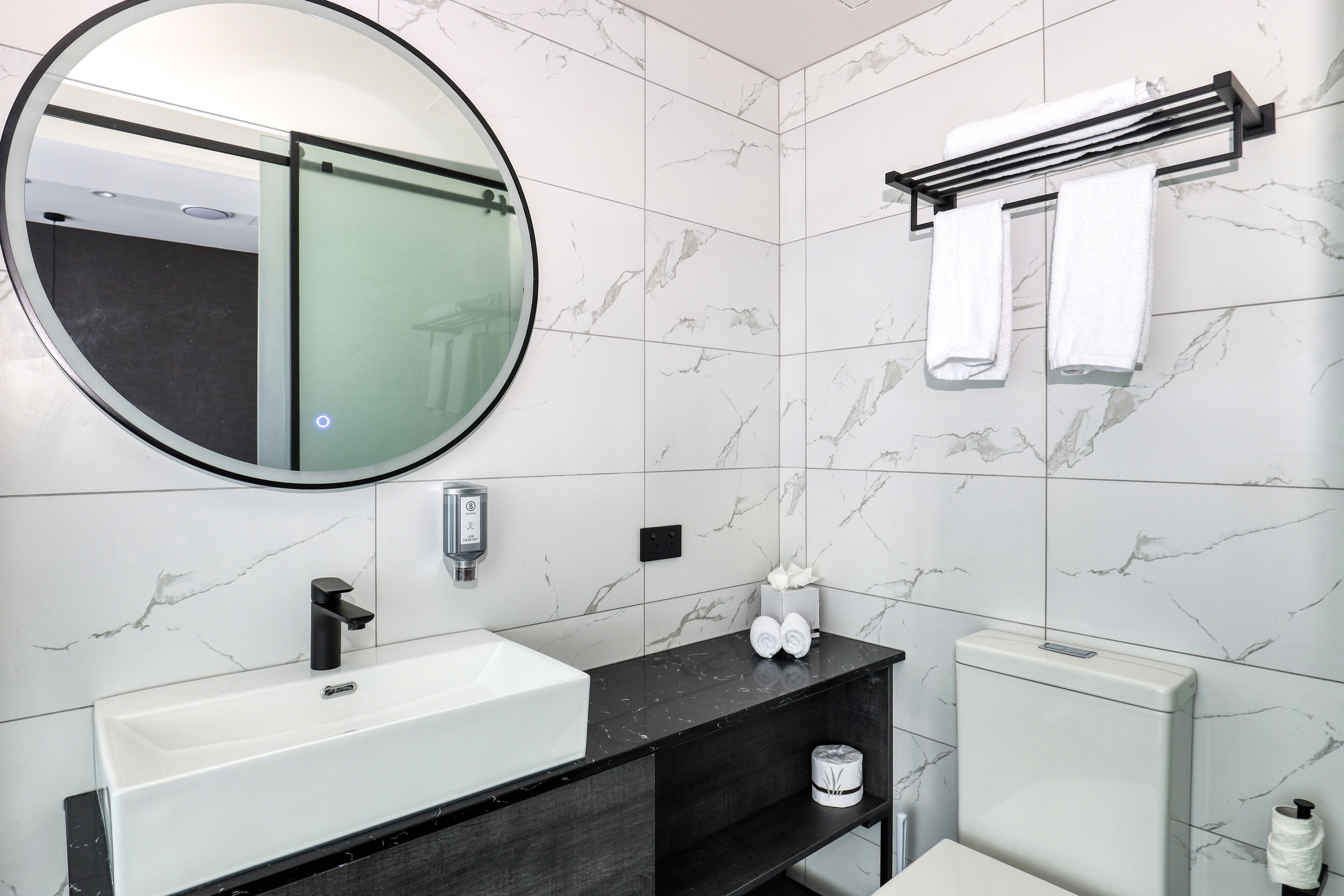 shower, free toiletries, hair dryer, towels