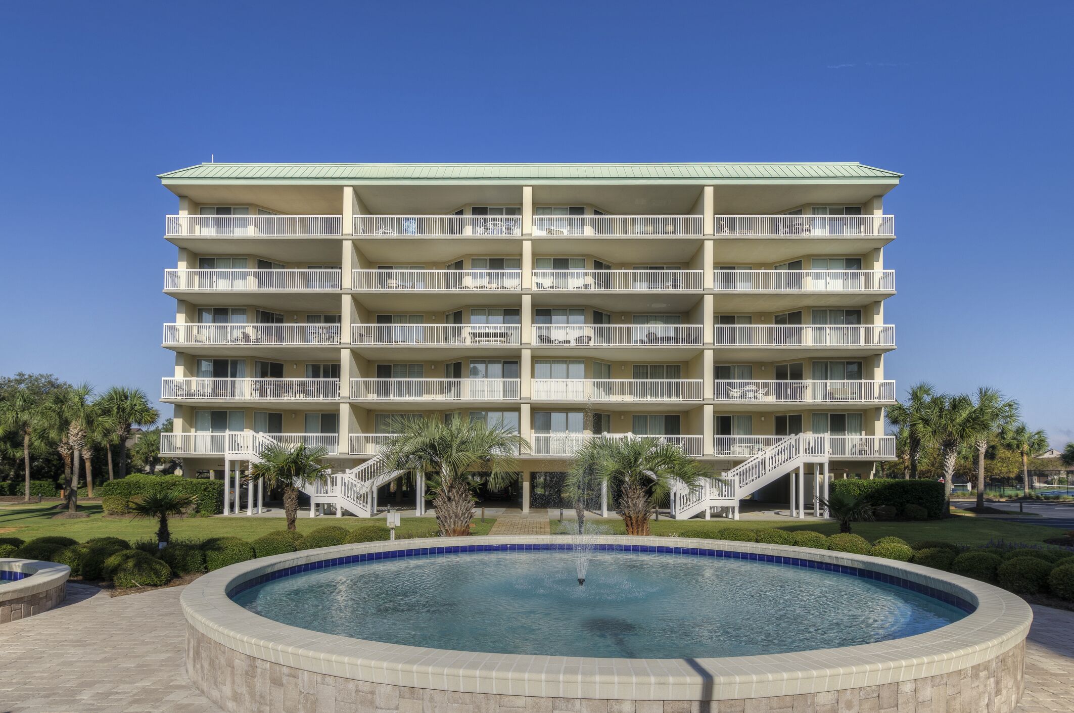 Oceanside Condo with community pool and easy beach access in gated Litchfield Beach community.