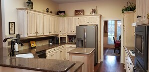 Fridge, microwave, oven, stovetop - Backyard haven, modern house in upscale subdivision (North Richland Hills)