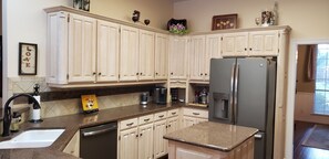 Fridge, microwave, oven, stovetop - Backyard haven, modern house in upscale subdivision (North Richland Hills)