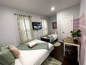 4 bedrooms, desk, iron/ironing board, travel cot