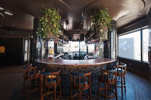 Rooftop bar, al fresco dining, open daily