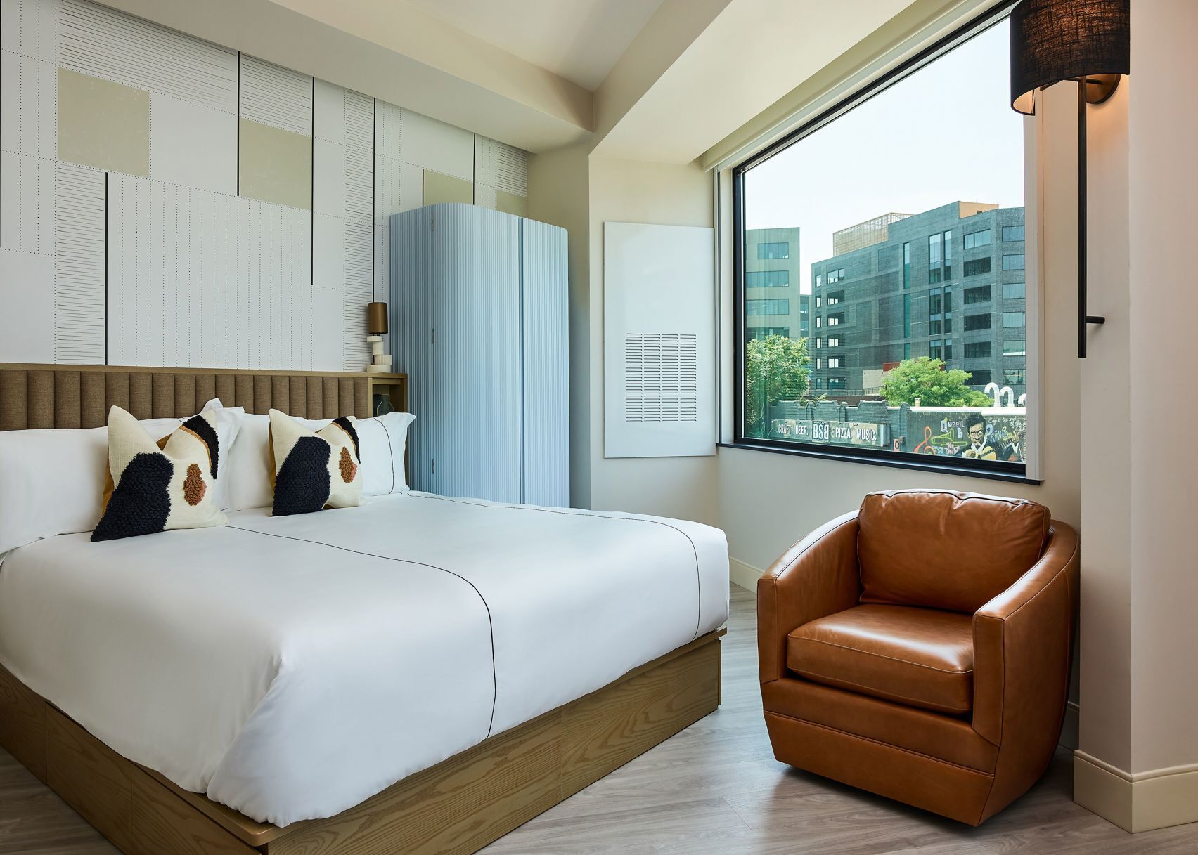 Premium bedding, down comforters, pillowtop beds, in-room safe