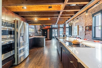 Klee House | Private kitchen | Full-size fridge, microwave, oven, stovetop at Catbird Hotel