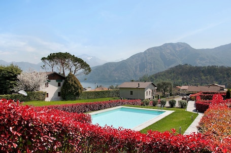 Pool. Appartamento Zerboni C1 with Lake & Mountain View, Pool, Wi-Fi, Garden & Terrace
