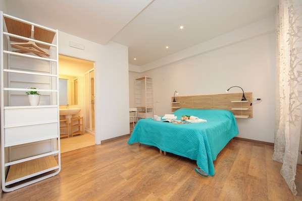 Family Apartment, Multiple Bedrooms, 2 Bathrooms, Beachside (Residenza Rocca del Lago) | 3 bedrooms, iron/ironing board, free WiFi, bed sheets