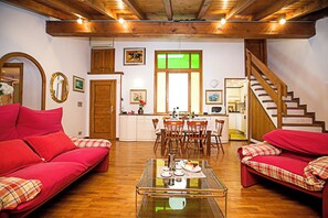 Family Apartment, Multiple Bedrooms, Beachside (Residenza Rocca del Lago 2) | Living area | 21-inch flat-screen TV with cable channels, TV - Residenza Rocca del Lago 3 (Riva del Garda)