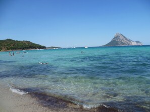 On the beach, sun loungers