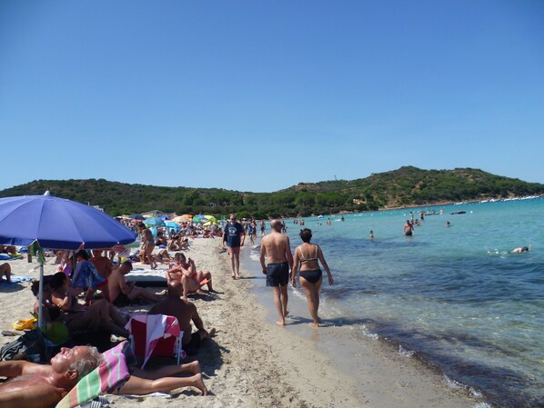 On the beach, sun loungers