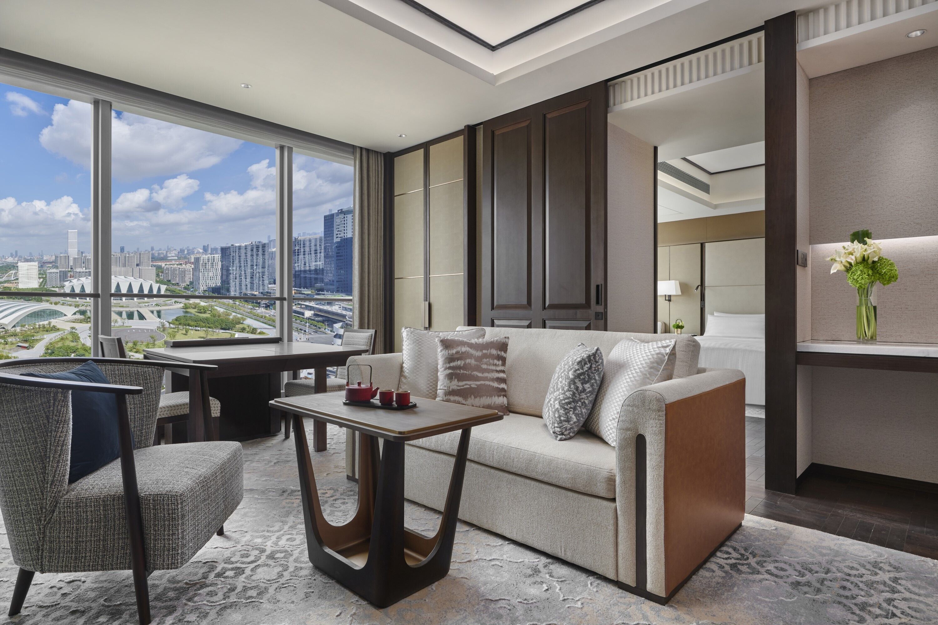 Deluxe River View Suite King | Living area | 55-inch Smart TV with cable channels, TV