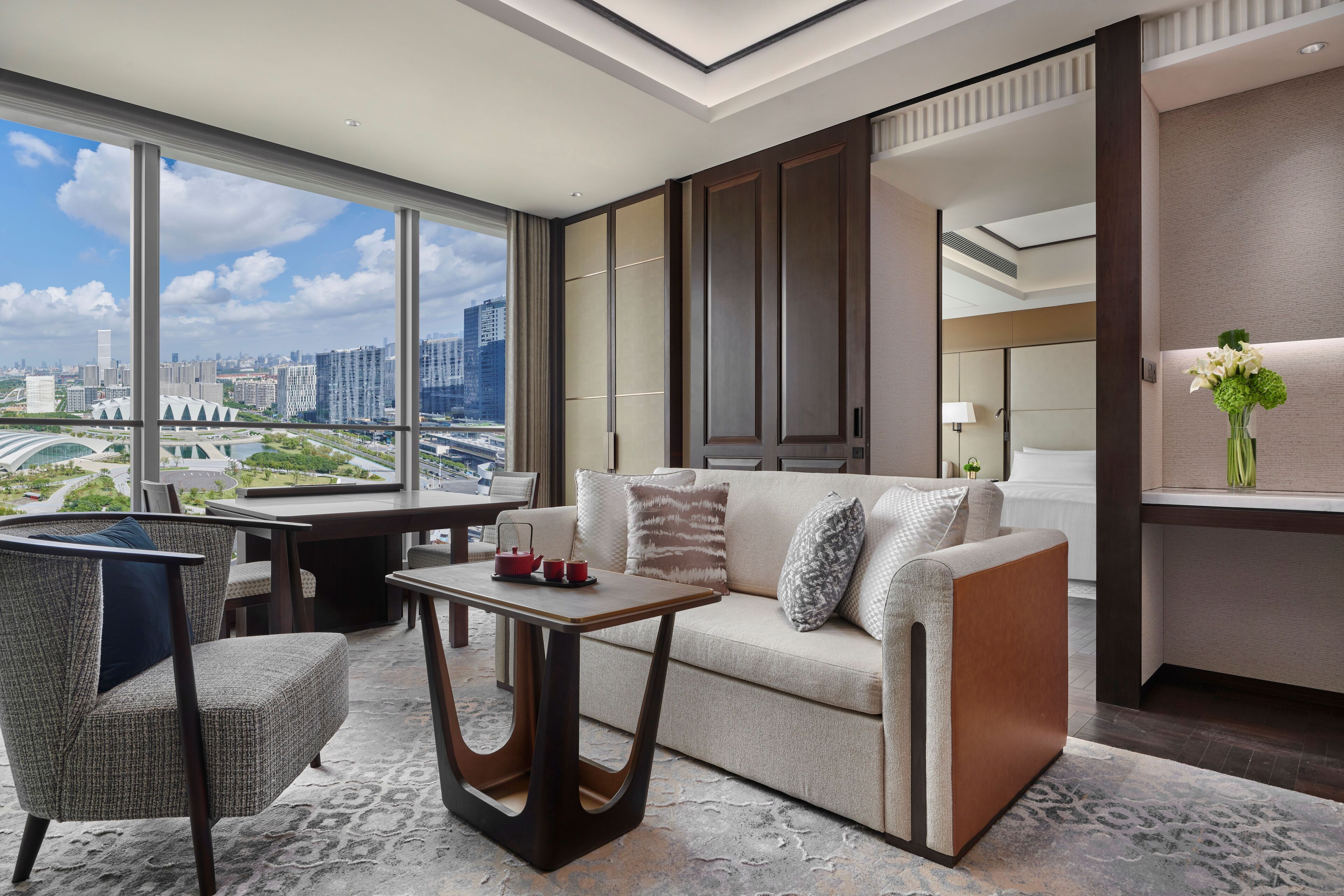 Deluxe River View Suite King | Living area | 55-inch Smart TV with cable channels, TV