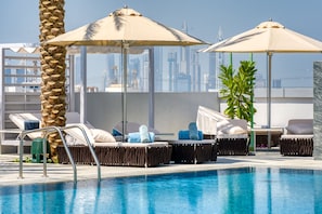 Outdoor pool, open 9:00 AM to 7:00 PM, free cabanas, pool umbrellas - The First Collection Dubai Jumeirah Village Circle, a Tribute Portfolio Hotel (Dubai)
