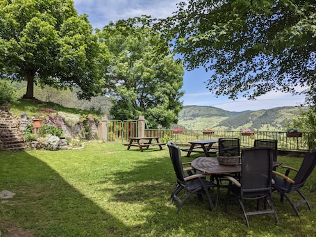 Outdoor dining. Large double guest room for families