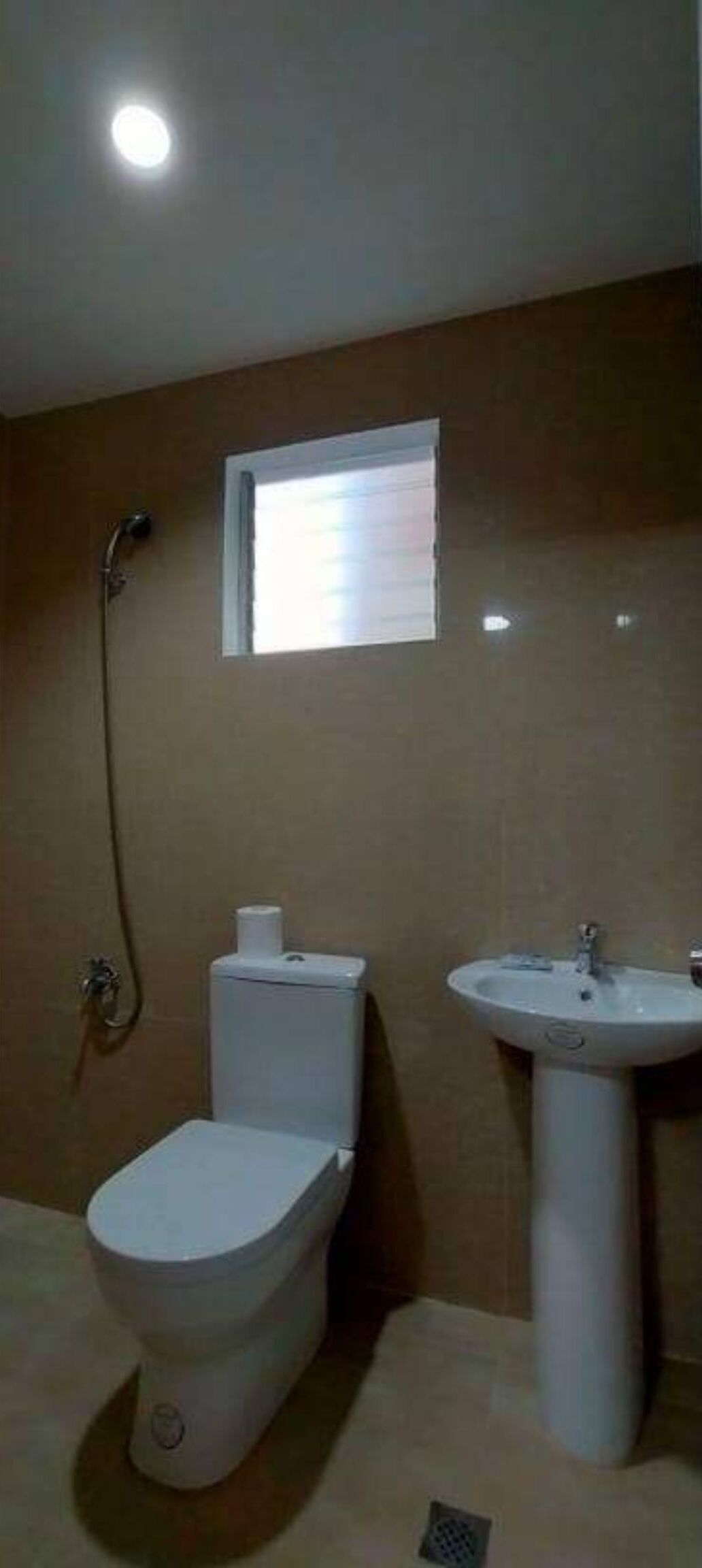 Shower, rainfall showerhead, towels, toilet paper