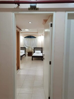 Habitación estándar con 2 camas individuales | Ropa de cama